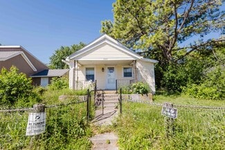 Multi-Property Absolute Auction