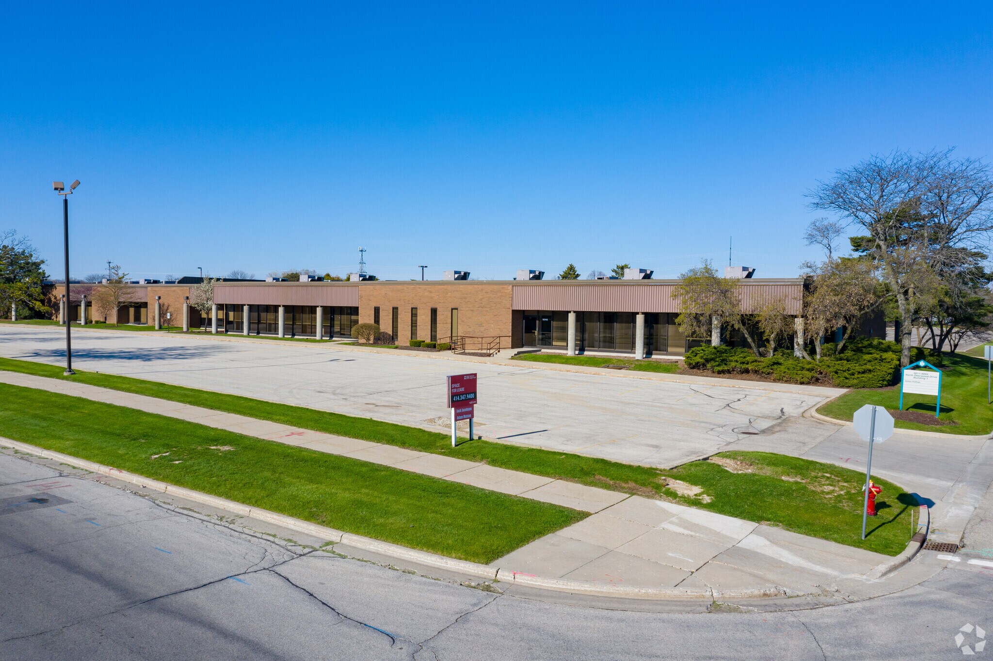 9045 N Deerwood Dr, Brown Deer, WI for Sale