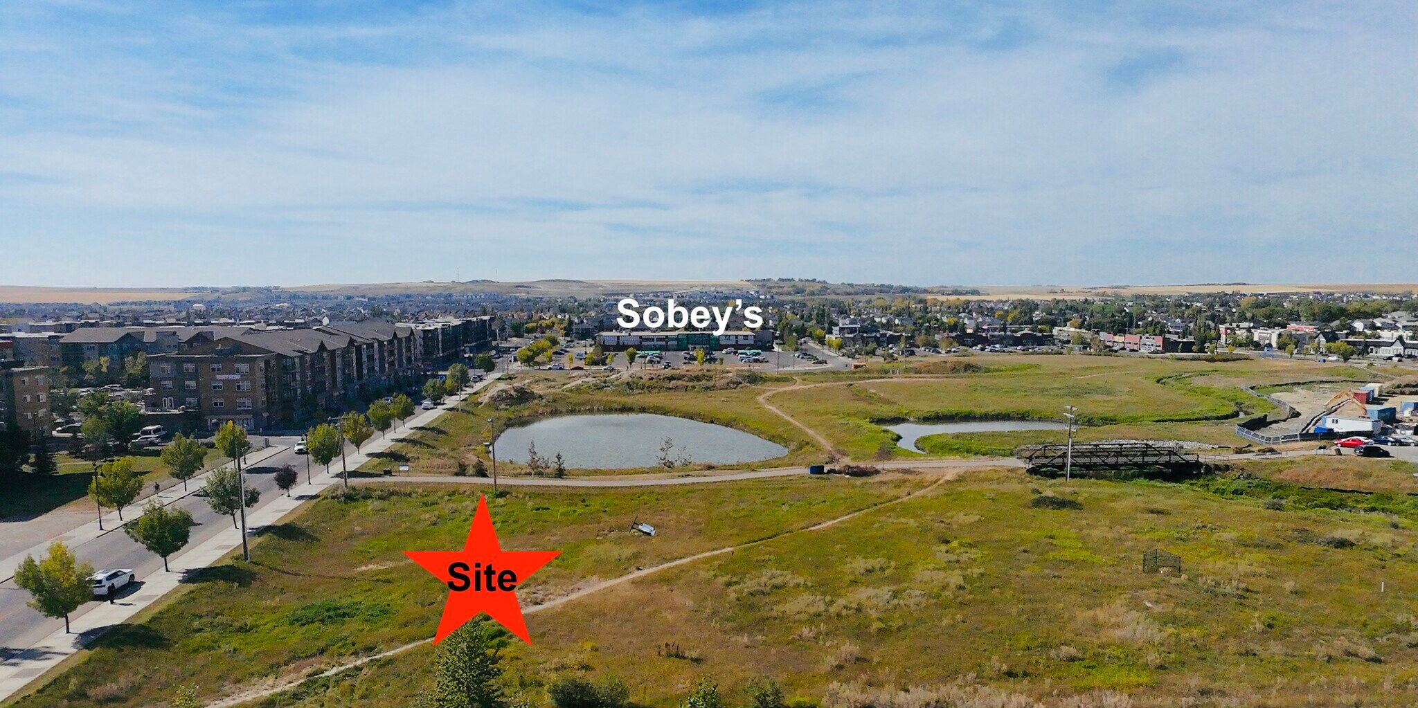 128 Railway Avenue Southwest, Airdrie, AB for Sale