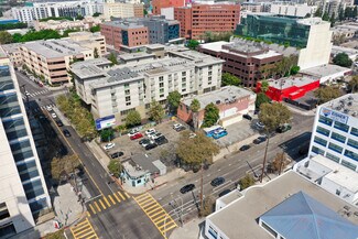 Corner Building + Parking Lot w/ Income