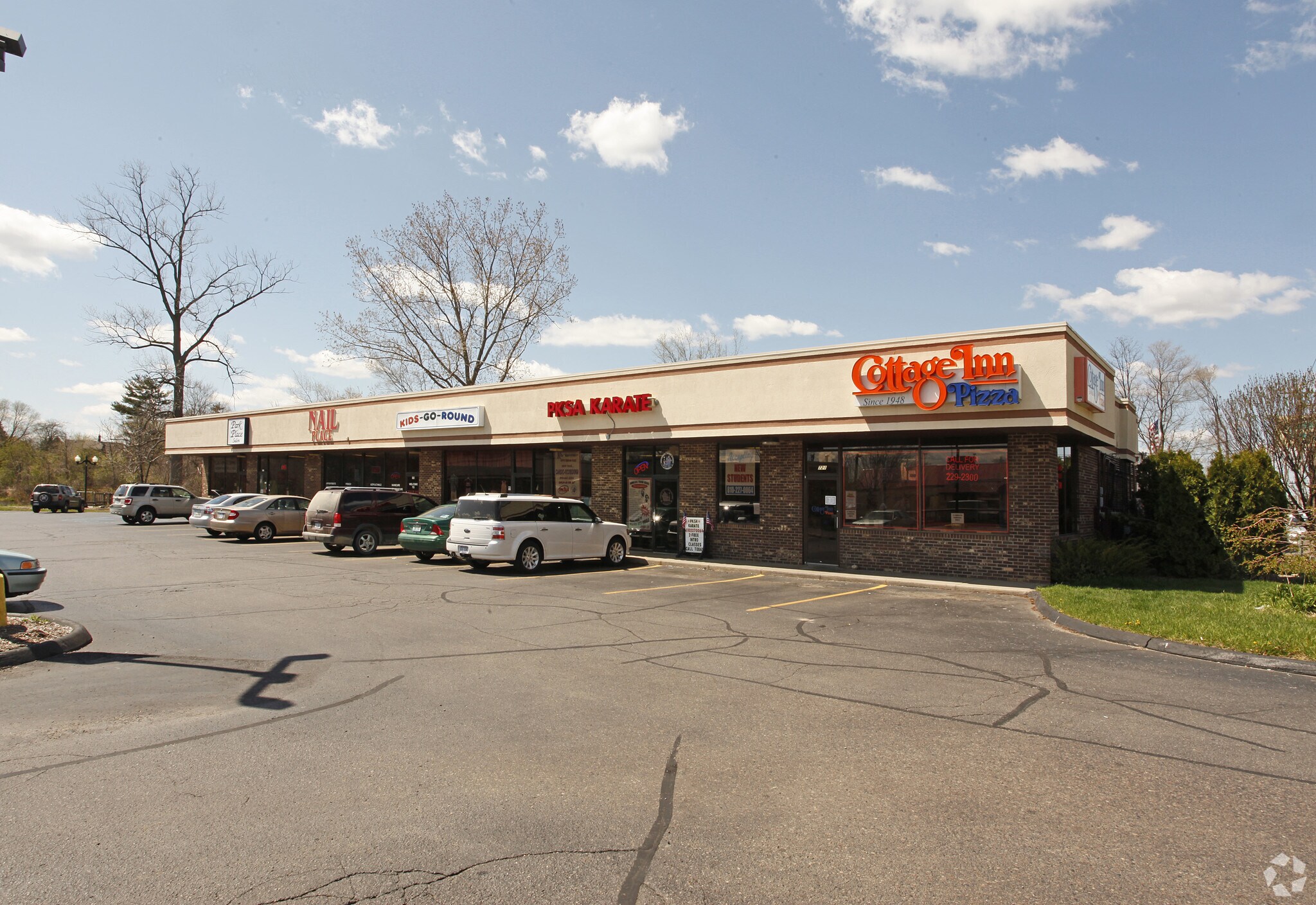 709721 W Grand River Ave Brighton, MI 48116 Shopping Center Property