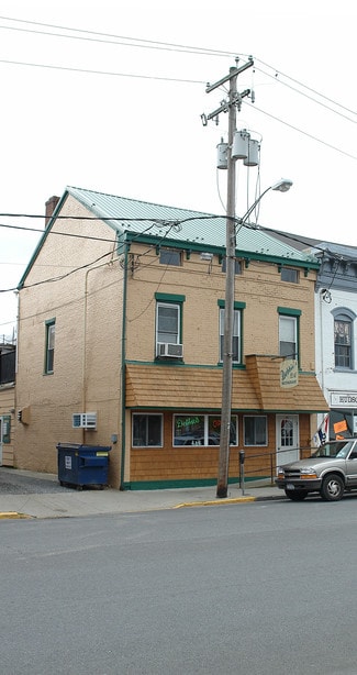 Oasis Bldg & Mechanics Apartments