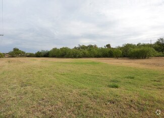 8661-8689 John T White Rd  